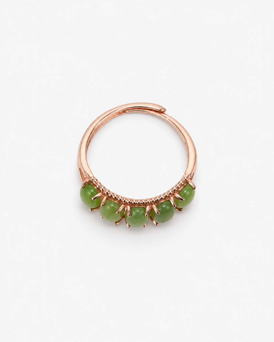 Top view of the YÙN 05 five-stone green nephrite jade ring in gold